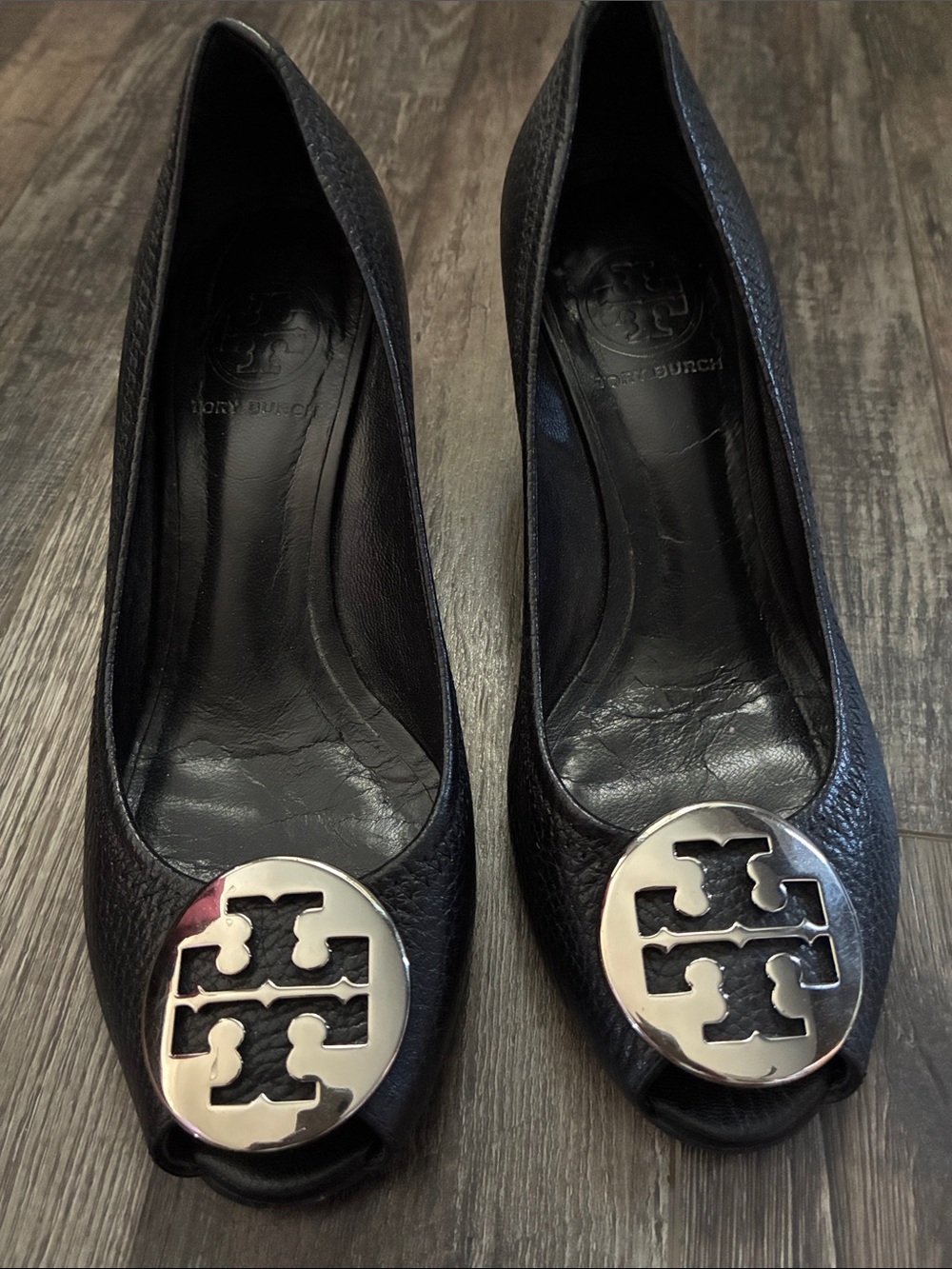 Tory Burch Black Leather Peep-Toe Heels with Silver Logo Medallions. Size 6.5